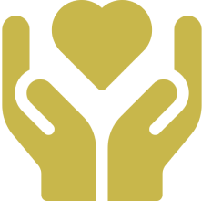 Gold stylized hands gently cradle a heart against a black background, symbolizing care, love, compassion, and emotional support.